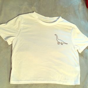 White crop top with a dinosaur on the front